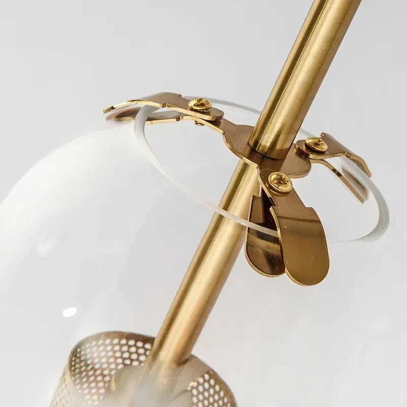 Modern Glass Wall Sconce with Metal Detail